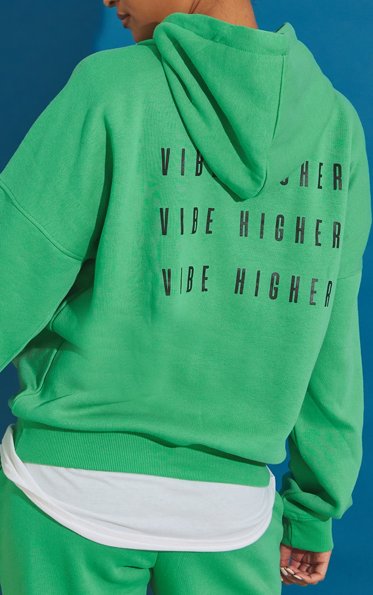 Hoodie oversize vert à slogan imprimé au dos image 4