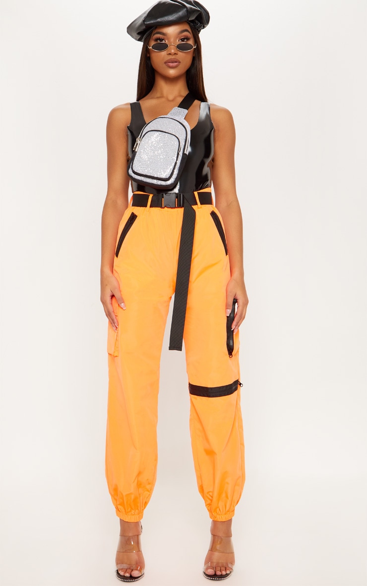 Jogging fluide orange à poches et ceinture