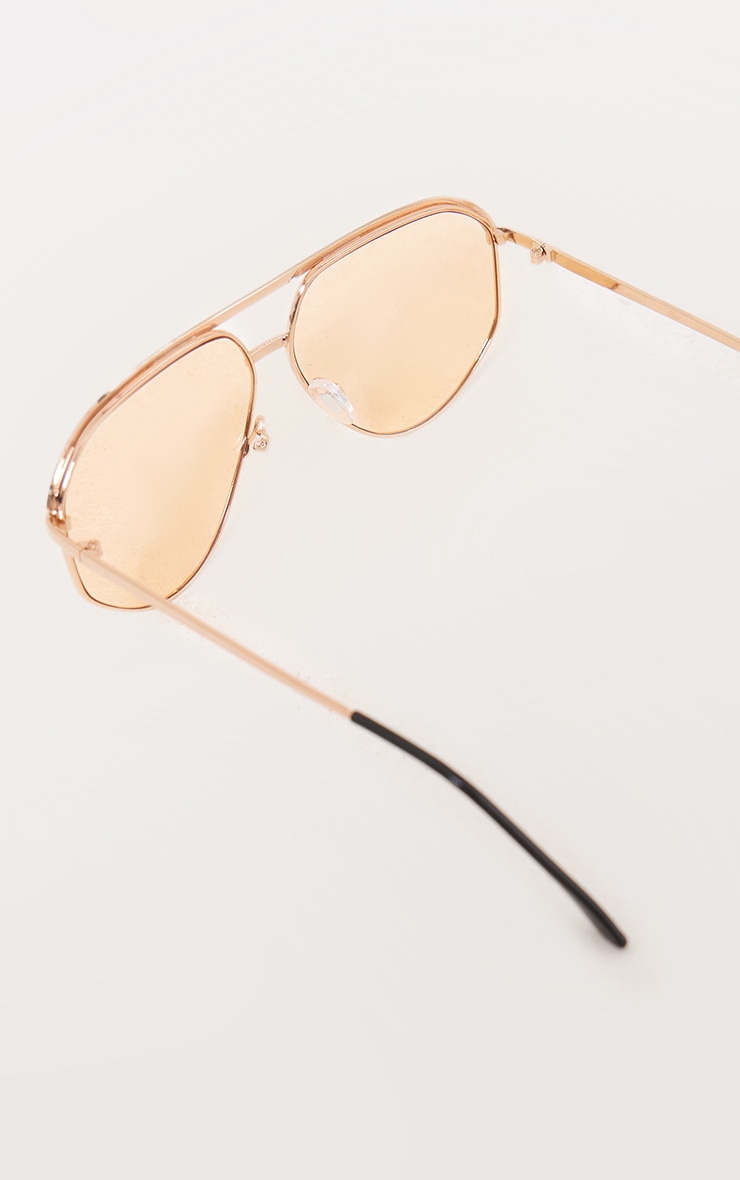 Lunettes de soleil style aviateur à lentilles oranges et barre dorée image 3