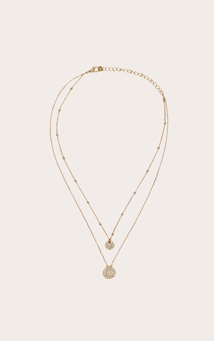 Collier superposé doré à pendentifs en cercles image 2