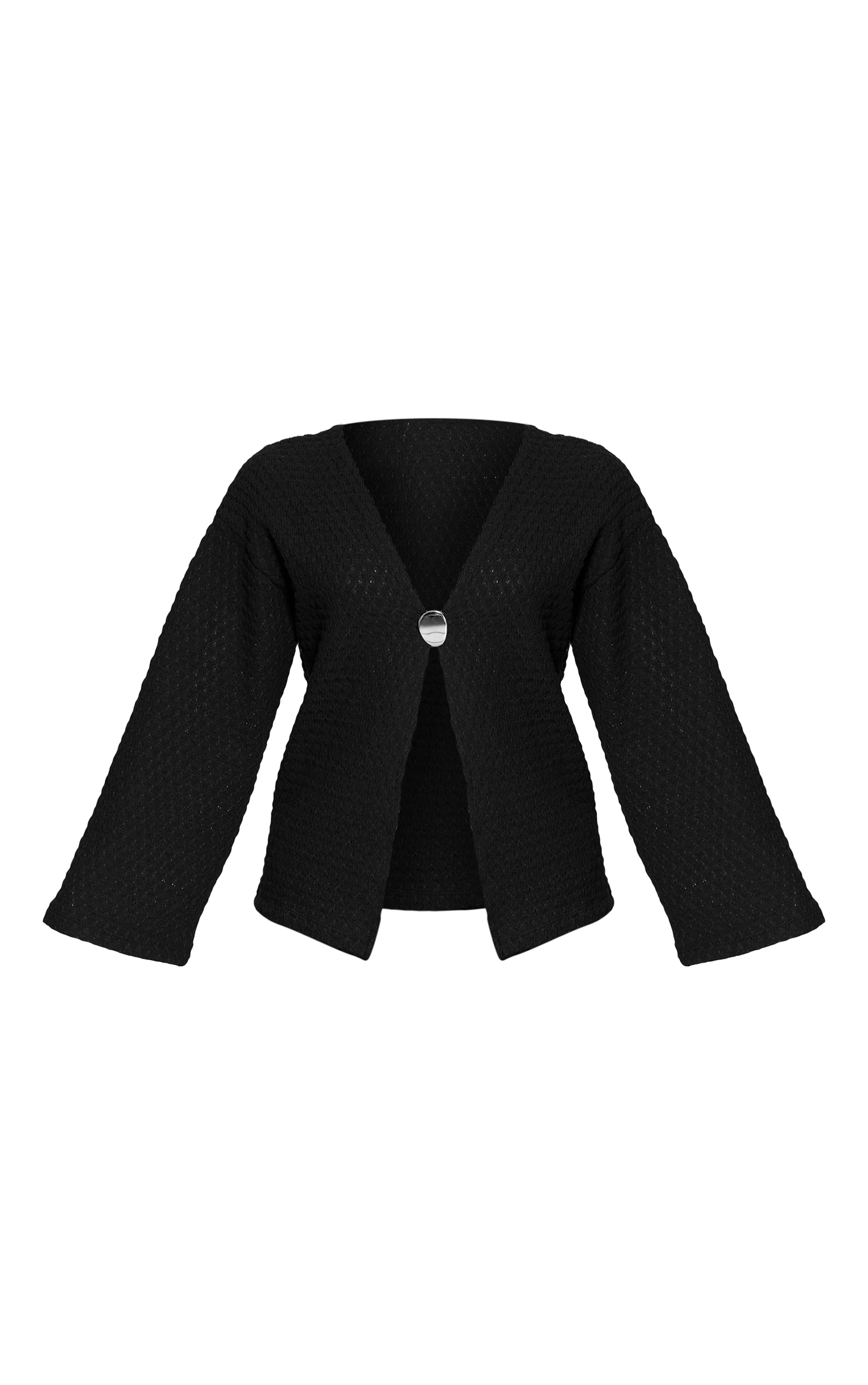 Top oversize texturé noir à manches longues et empiècement image 5
