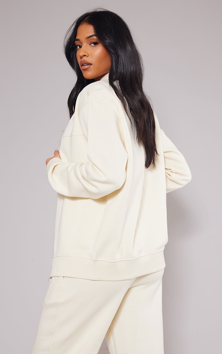 PRETTYLITTLETHING Tall Cream Embroidered Seam Detail Zip Through Track Top image 2