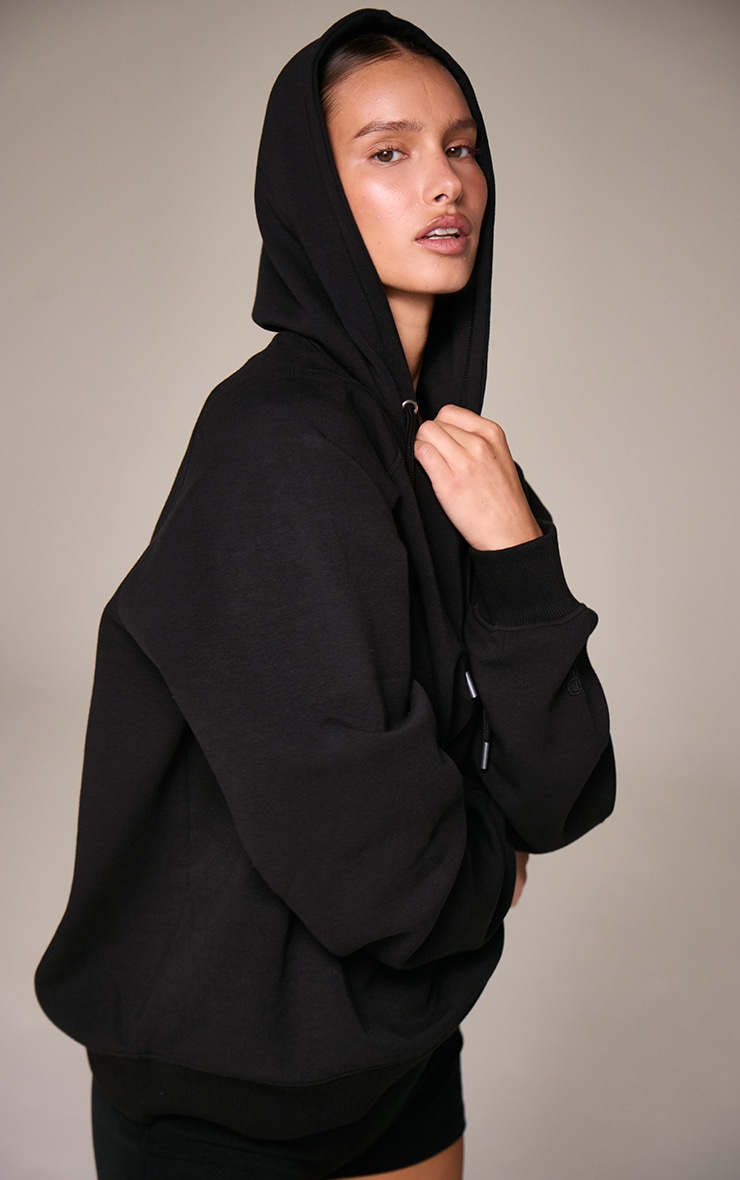 Hoodie tissé noir à logo brodé image 1