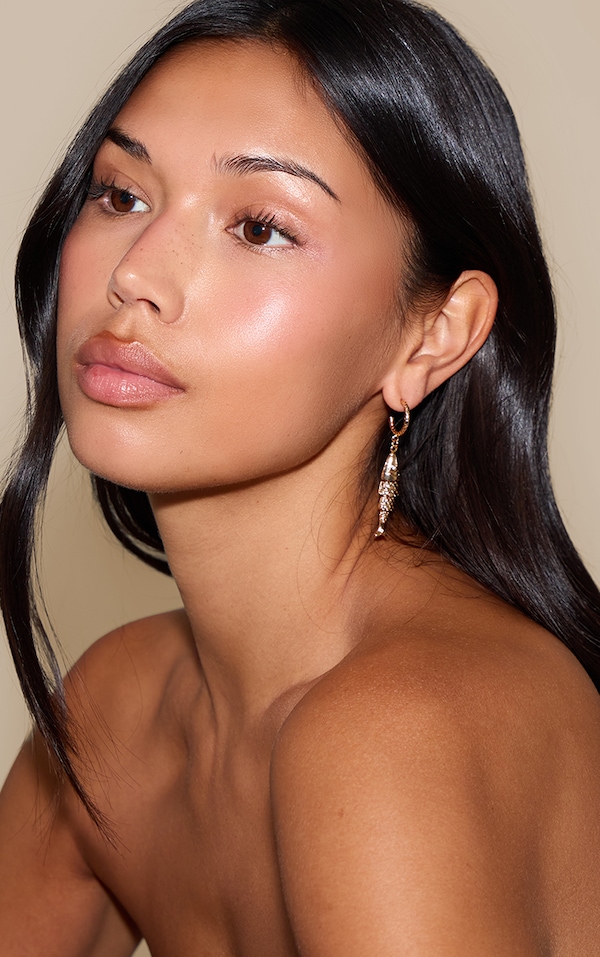 Boucles d'oreilles tombantes dorées en forme de poisson