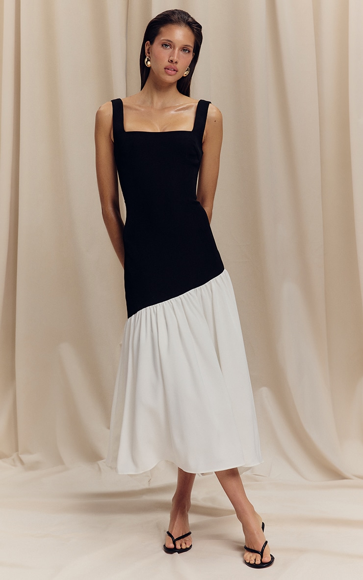 Robe mi-longue noire et blanche à col carré et ourlet plissé contrastant | Robes