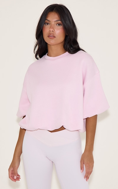Sweat bouffant élastique rose tendre à épaules carrées