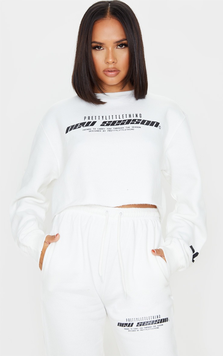 PRETTYLITTLETHING Cream New Season Slogan Track Pants