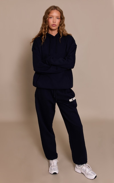 Jogging bleu marine imprimé "PLT Studio" à ourlets resserrés