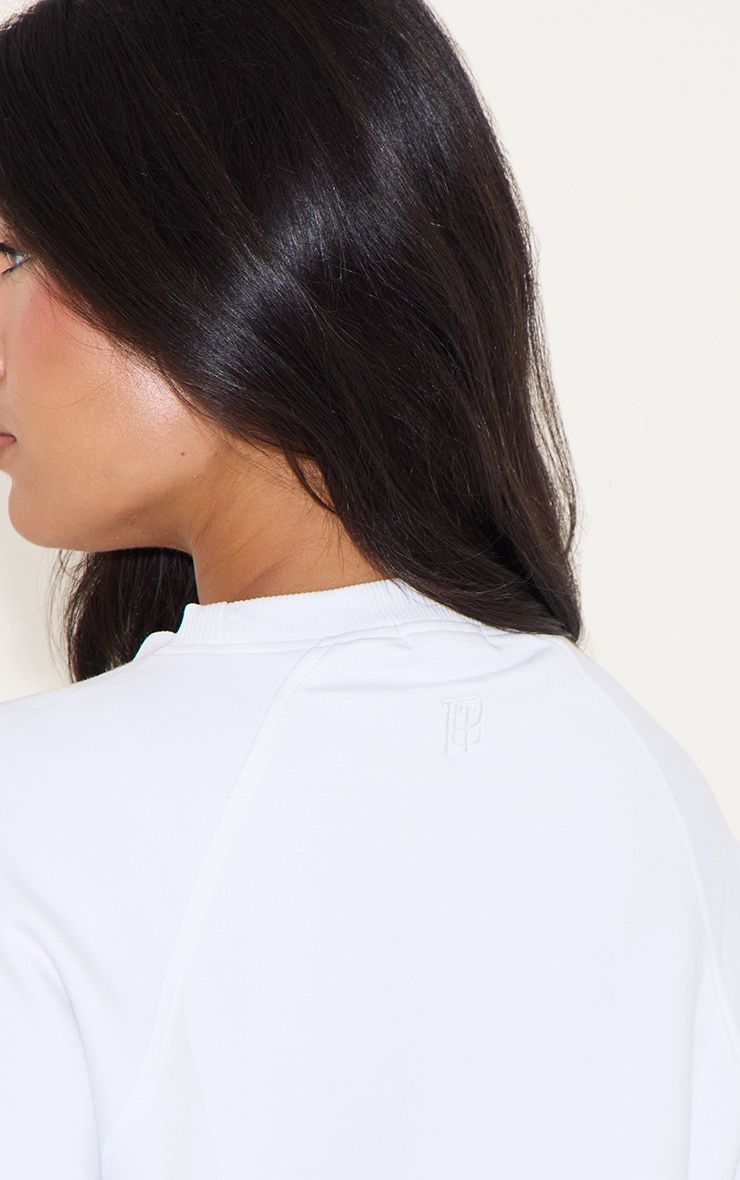 T-shirt tissé blanc à épaules carrées et logo brodé image 4