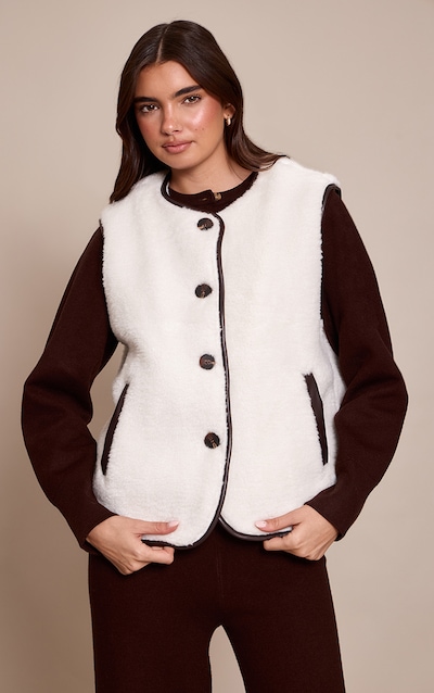 Gilet en imitation mouton crème à brodures en PU