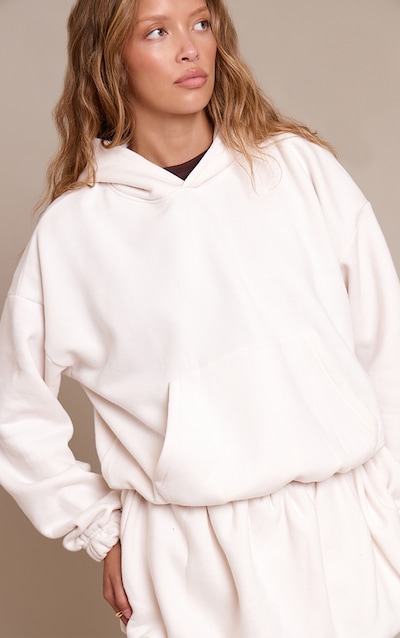 Sweat à capuche à coupe ballon en molleton gratté crème