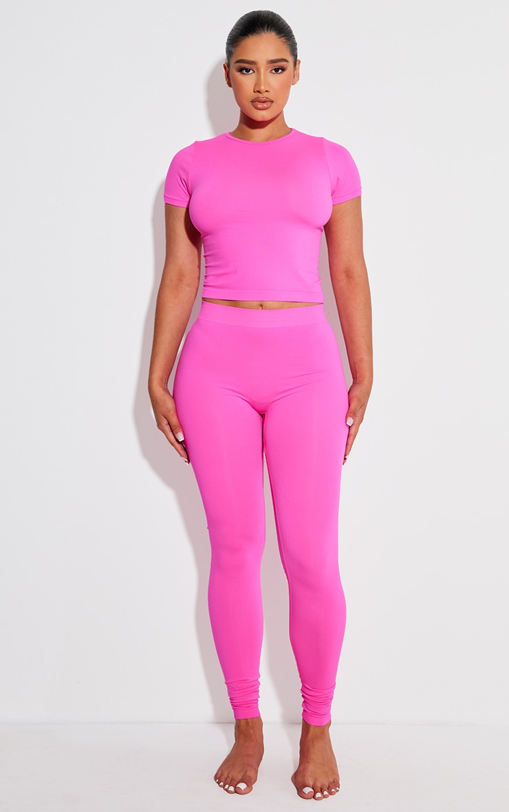 Prettylittlething Women s Shape Neon Pink Stretch Seamless Short Sleeve Longline Top Size S