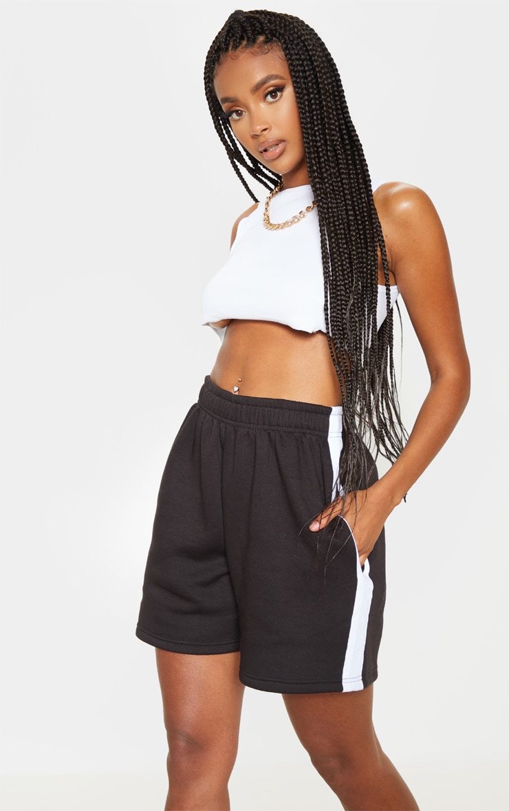 Short long en sweat noir à bande contrastante sur le côté