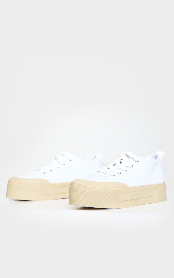 white canvas lace up flatform trainers