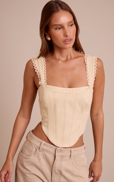 Corset crème tissé contrecollé à bordure festonnée