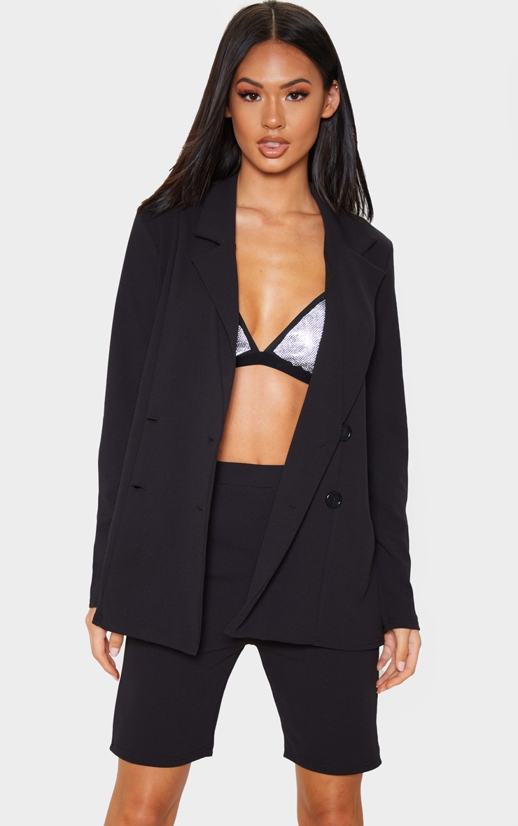 Veste de tailleur noire croisée à boutons