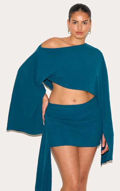 Top Coupe Ample Tissé Flottant Bleu Canard Avec Encolure Bateau Et Manches Longues