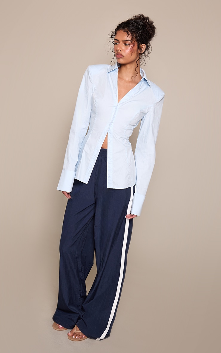 Pantalon bleu marine à rayures contrastantes et ourlets resserrés