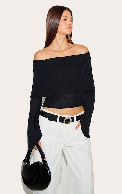 Top long texturé noir à col bardot replié et manches très évasées