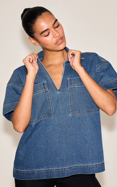 Chemise style rugby en jean bleu foncé à manches courtes et poches