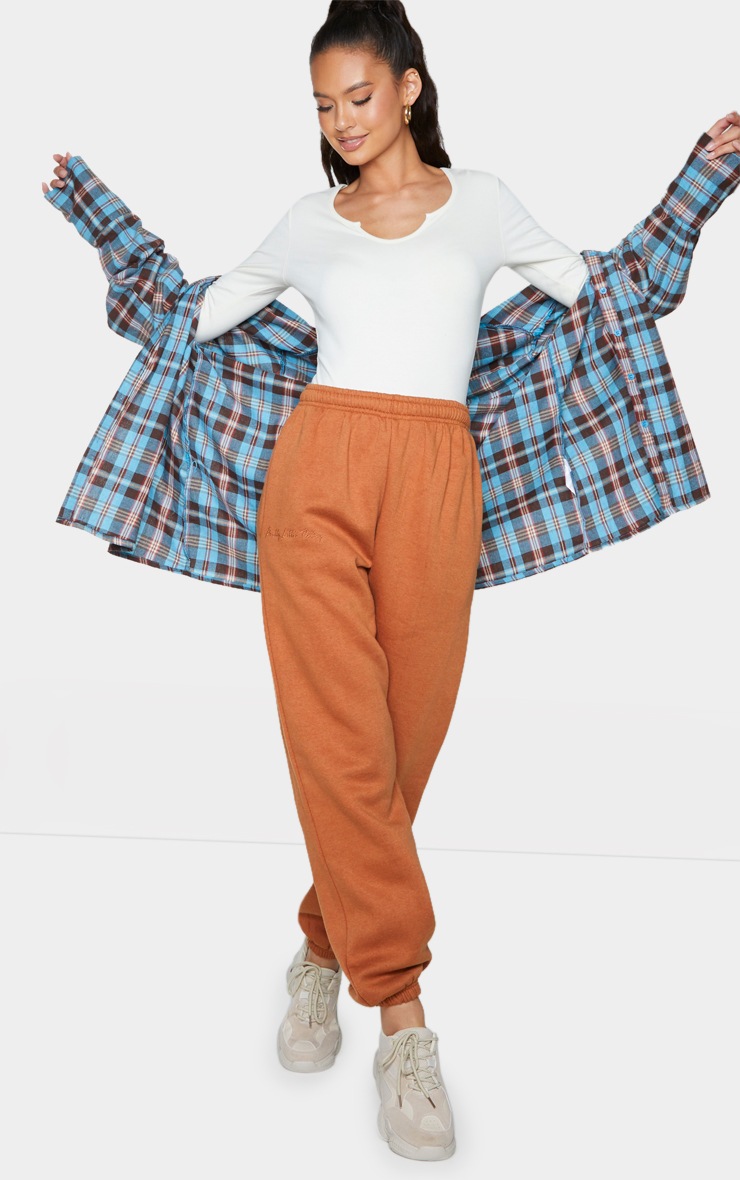 PRETTYLITTLETHING Rust Embroidered Joggers