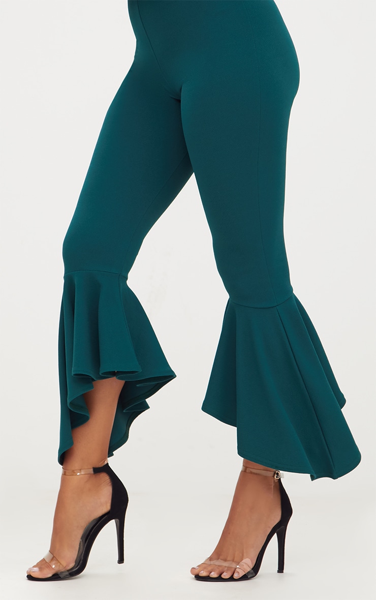 asymmetric flare hem trousers