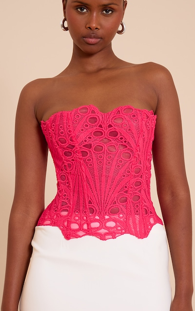 Corset en dentelle texturée fuchsia transparente fleurie