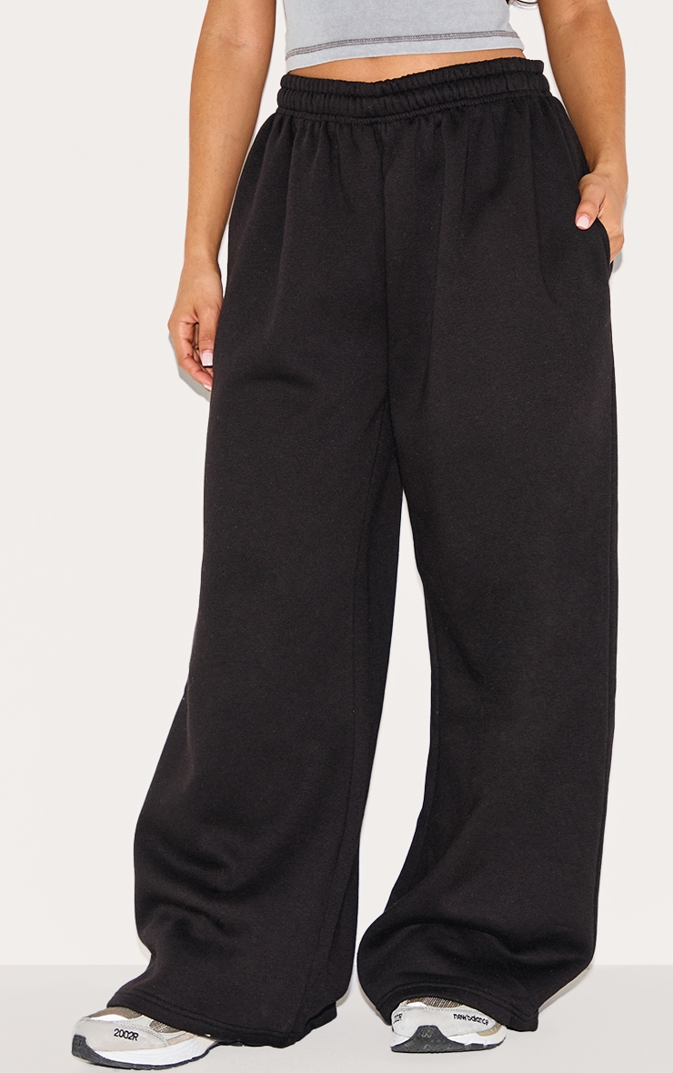 Petite Black Super Wide Leg Elasticated Waist Track Pants image 1