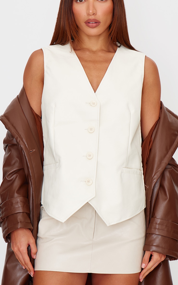 Cream Faux Leather Oversized Vest | Tops | PrettyLittleThing USA