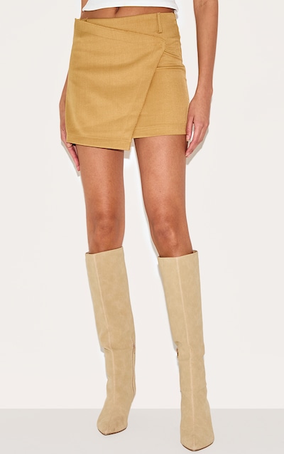 Mini jupe-short tissée vert olive à bordures élimées