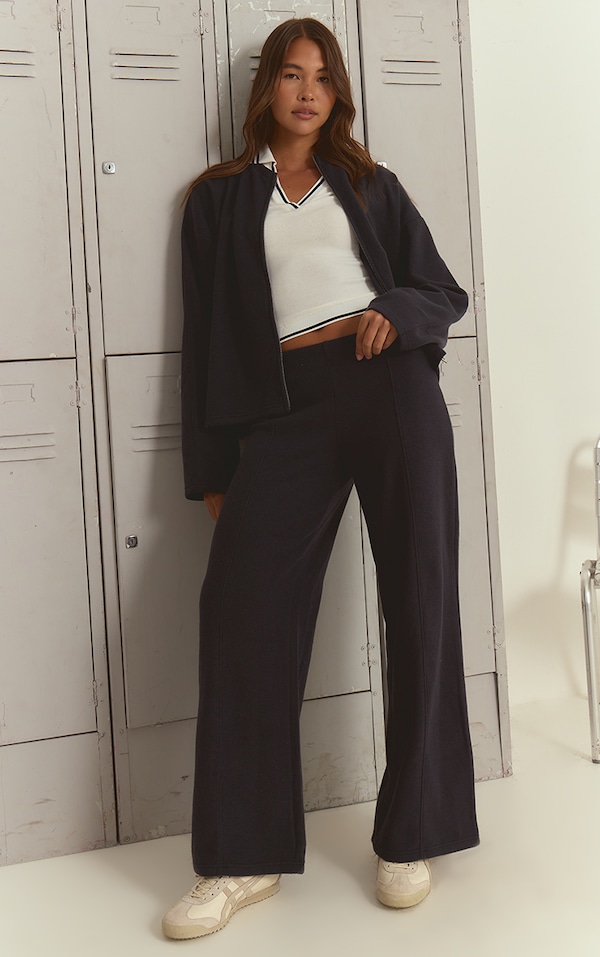 Pantalon large doux bleu marine à pinces