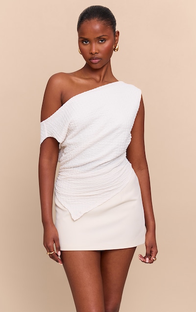 Top ample texturé crème à épaule dénudée et ourlet tombant