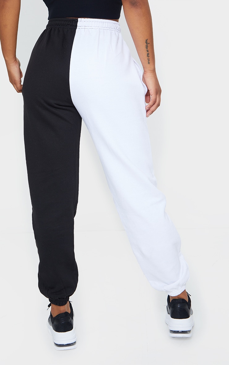 Half black sales half white sweatpants