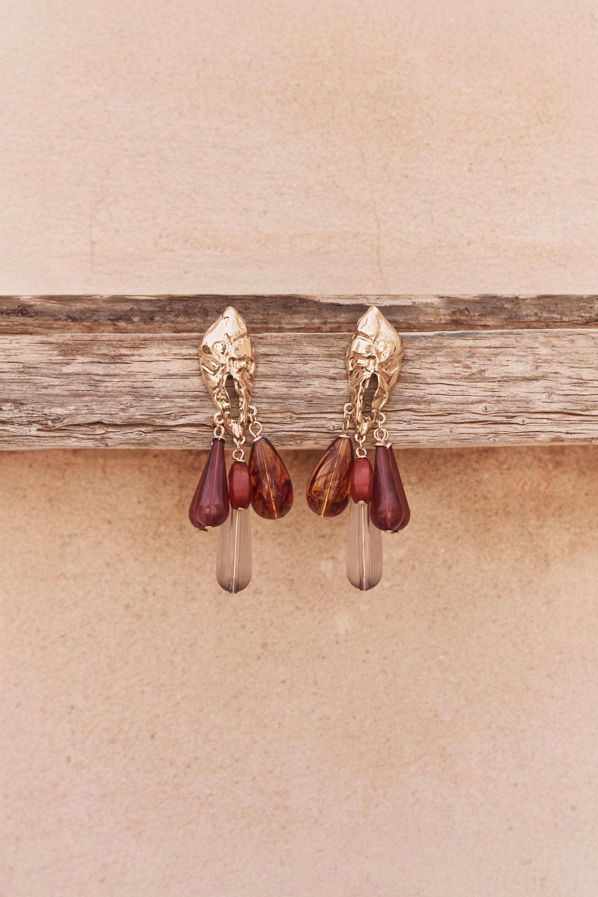 Gold Claw Tonal Resin Draped Earrings