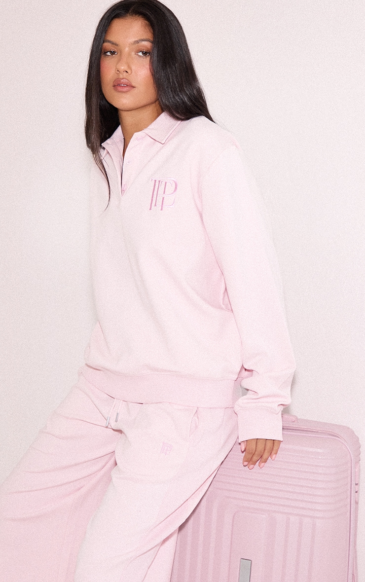 Pink Embroidered Interlock Button Polo Sweatshirt image 1