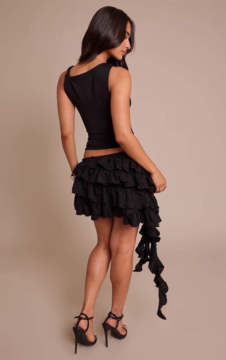 Petite Mini-jupe style tutu texturée noire à étages image 3