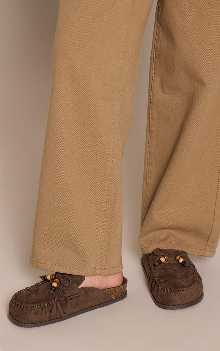 Mules en suédine kaki à détail franges et double semelle