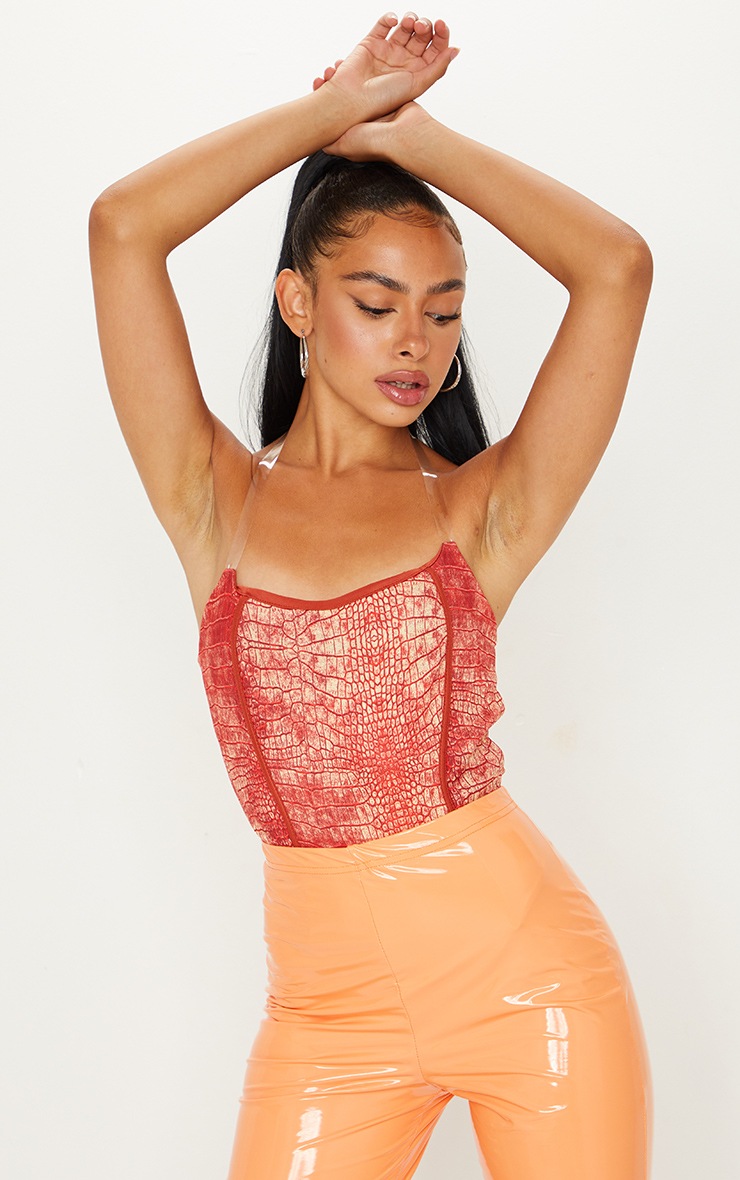 Body dos nu en néoprène orange imprimé serpent à bretelles transparentes