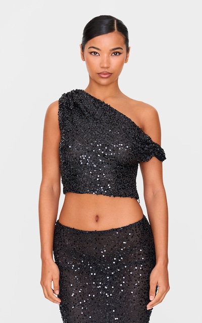 Top asymétrique texturé noir à sequins