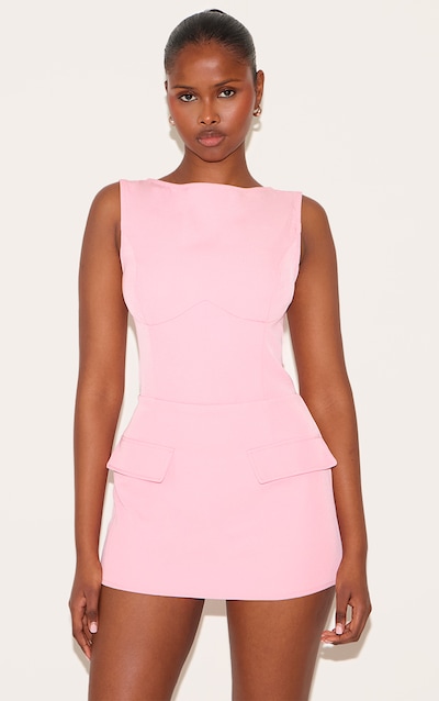 Combishort jupe-short tissé rose bonbon sans manches à détail poches