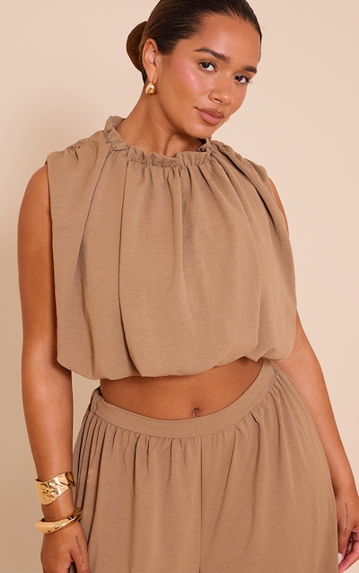 Shape Blouse bouffante satinée kaki à détail martelé