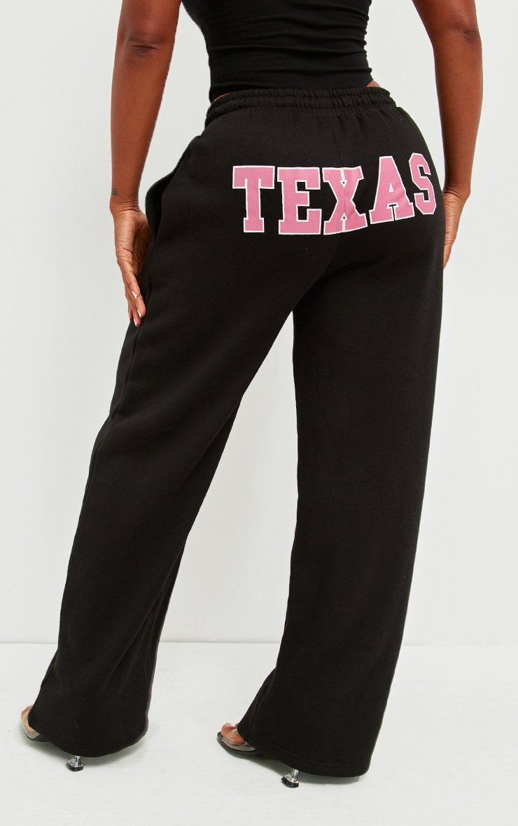 Tracksuit bottoms with writing on bum outlet