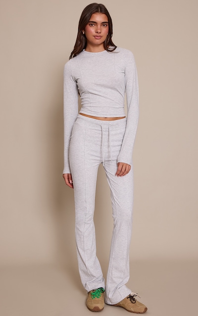 Pantalon skinny flare en coton gris cendré à lisérés surjetés et taille mi-haute