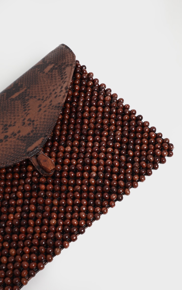 Brown snake print clutch bag discount