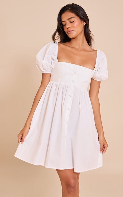 Robe babydoll boutonnée en coton blanc