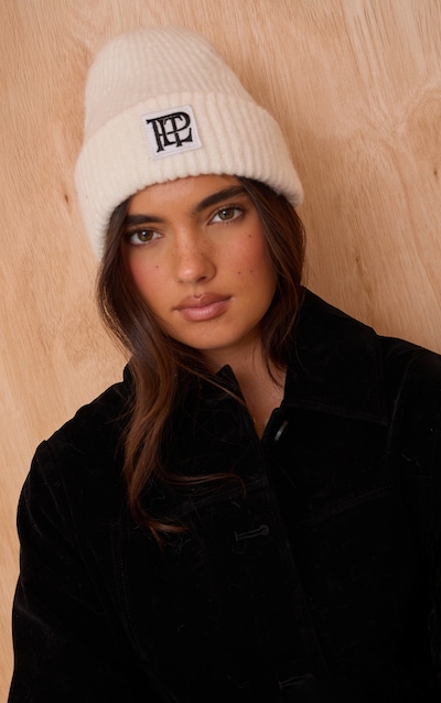 Bonnet replié en maille tricot brossée crème à logo PLT