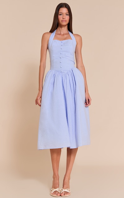 Robe mi-longue en coton brodé bleu ciel à dos nu