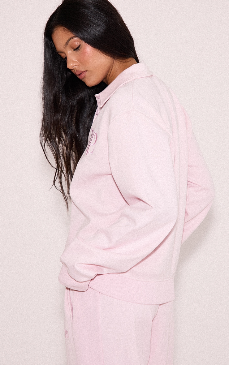 Pink Embroidered Interlock Button Polo Sweatshirt image 2