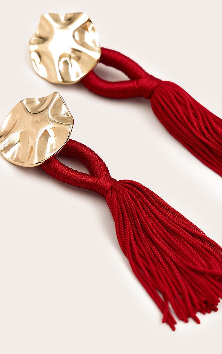 Gold Hammered Circular Earrings with Red Tassel Detail image 3