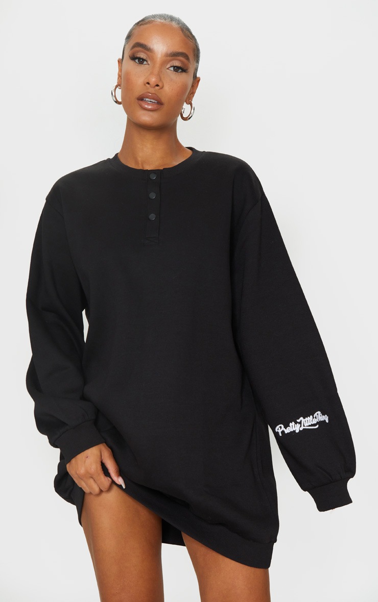 PRETTYLITTLETHING Black Embroidered Popper Sweater Dress